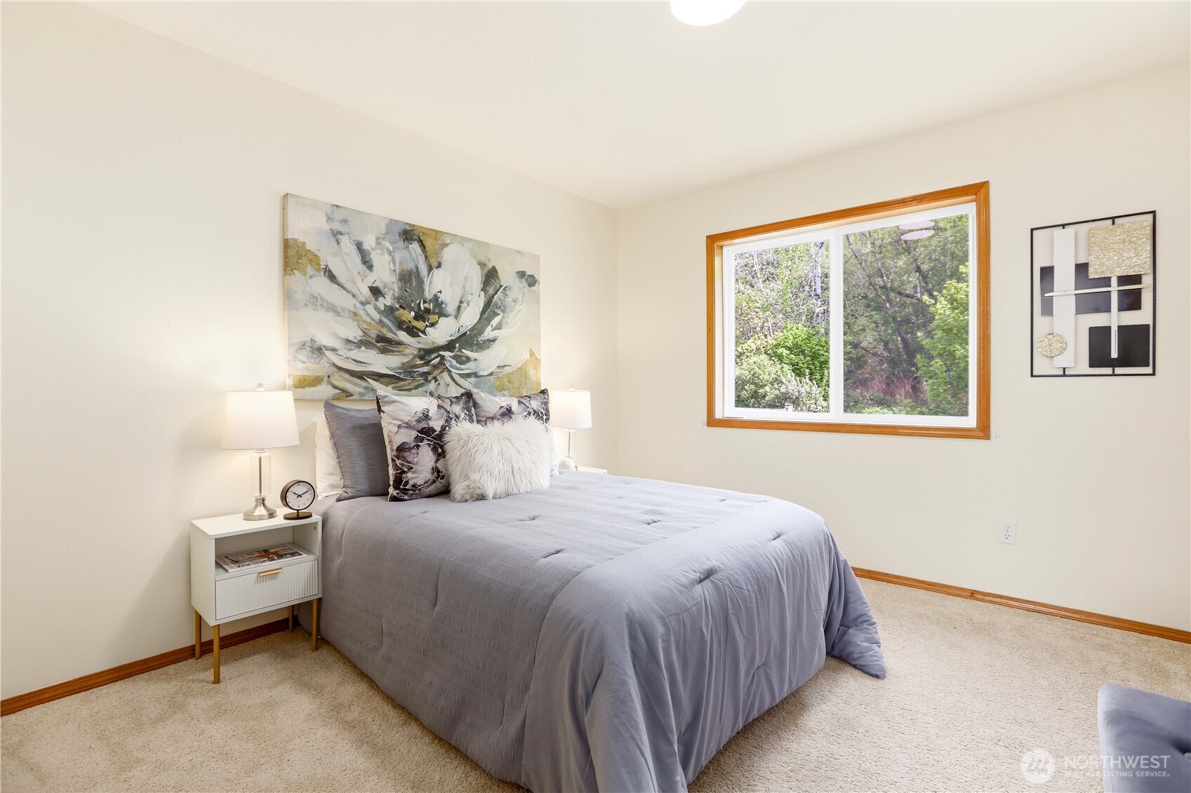 23327 8th Place West Bothell, WA 98021 - Photo 26 of 40 a bedroom with a bed and a window