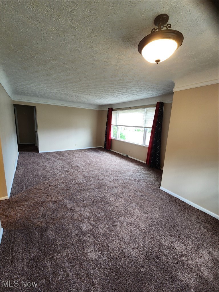9716 Alexander Road Garfield Heights, OH 44125 - Photo 7 of 19 Living Rm & Dining Rm