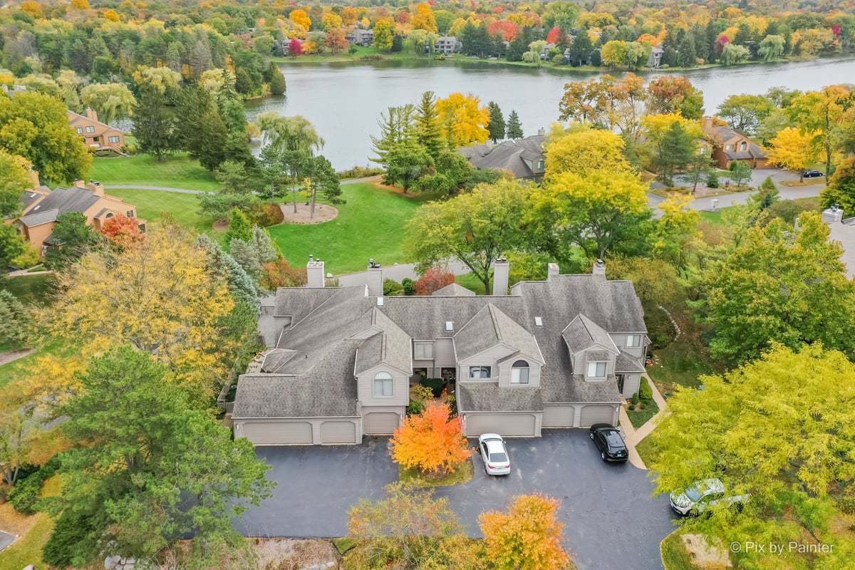 831 Shoreline Road Lake Barrington, IL 60010 - Photo 1 of 47 an aerial view of a house with outdoor space and lake view