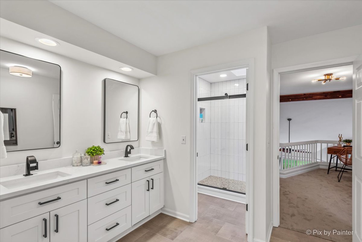 831 Shoreline Road Lake Barrington, IL 60010 - Photo 20 of 47 a bathroom with a granite countertop sink mirror and double