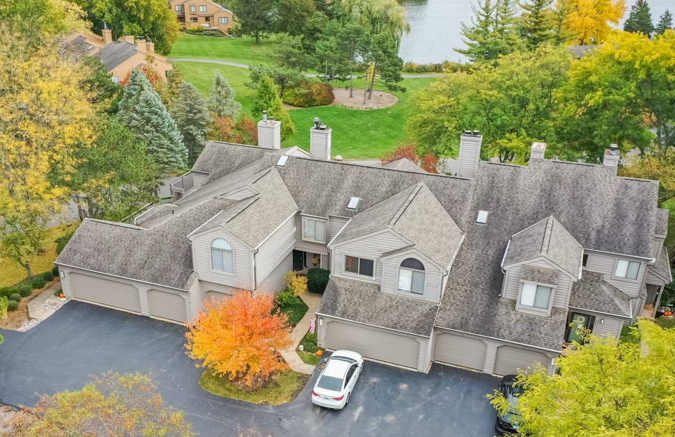 831 Shoreline Road Lake Barrington, IL 60010 - Photo 2 of 47 an aerial view of a house with backyard