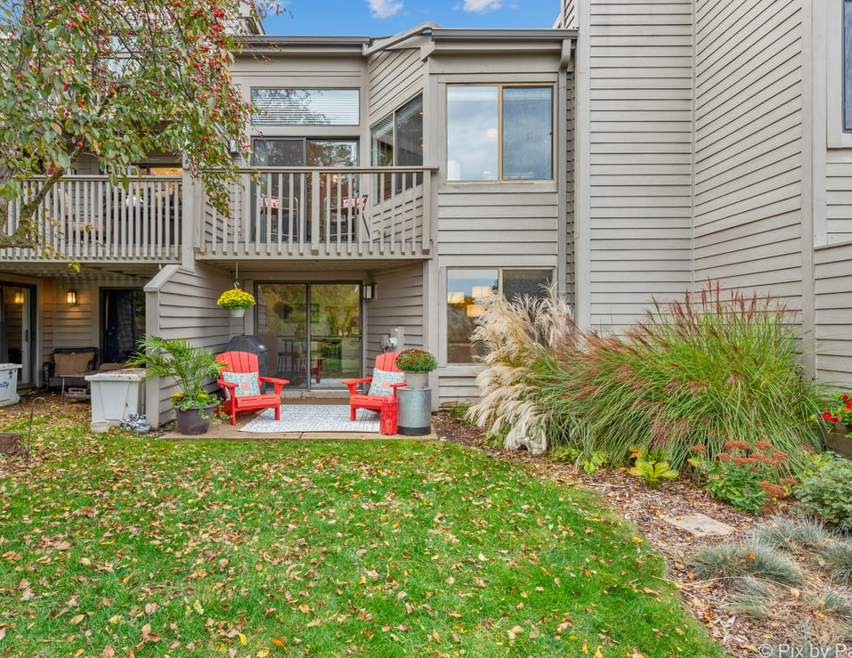 831 Shoreline Road Lake Barrington, IL 60010 - Photo 34 of 47 a view of a house with a yard and sitting area