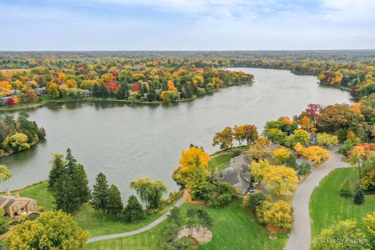 831 Shoreline Road Lake Barrington, IL 60010 - Photo 42 of 47 an aerial view of residential houses with outdoor space and lake view