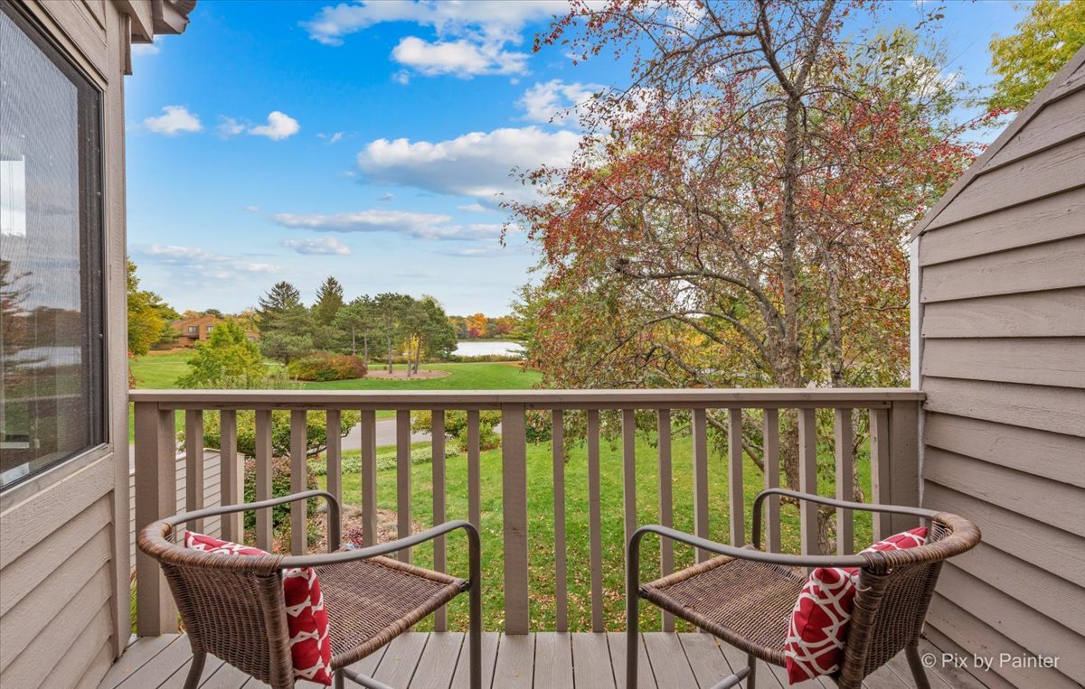 831 Shoreline Road Lake Barrington, IL 60010 - Photo 10 of 47 a view of a chairs in balcony