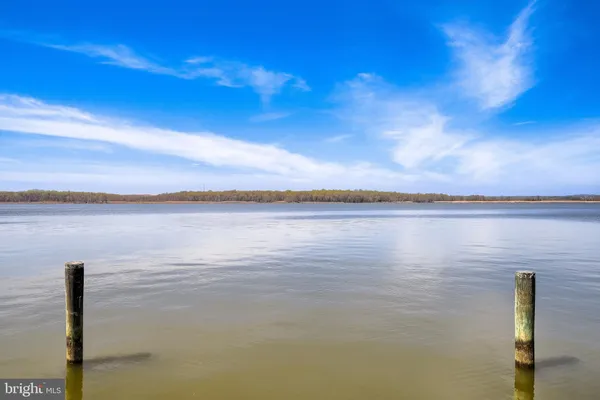 a view of a lake with a house and a lake view
