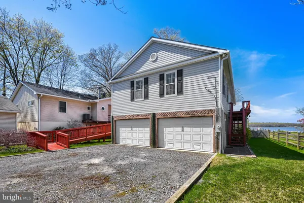 a black and white photo of a refrigerator