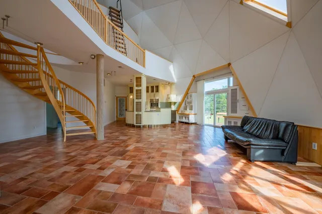 a view of storage and utility room with washer and dryer