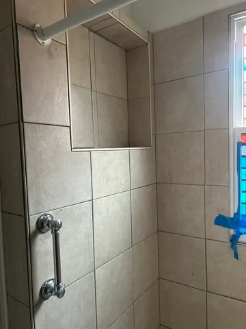 a bathroom with a shower