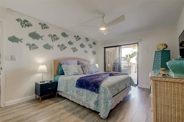 a bed room with a bed and a window