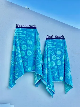 a view of swimming pool with an outdoor seating