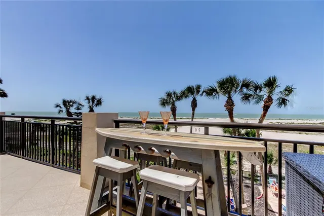 a view of a chairs and table on the terrace
