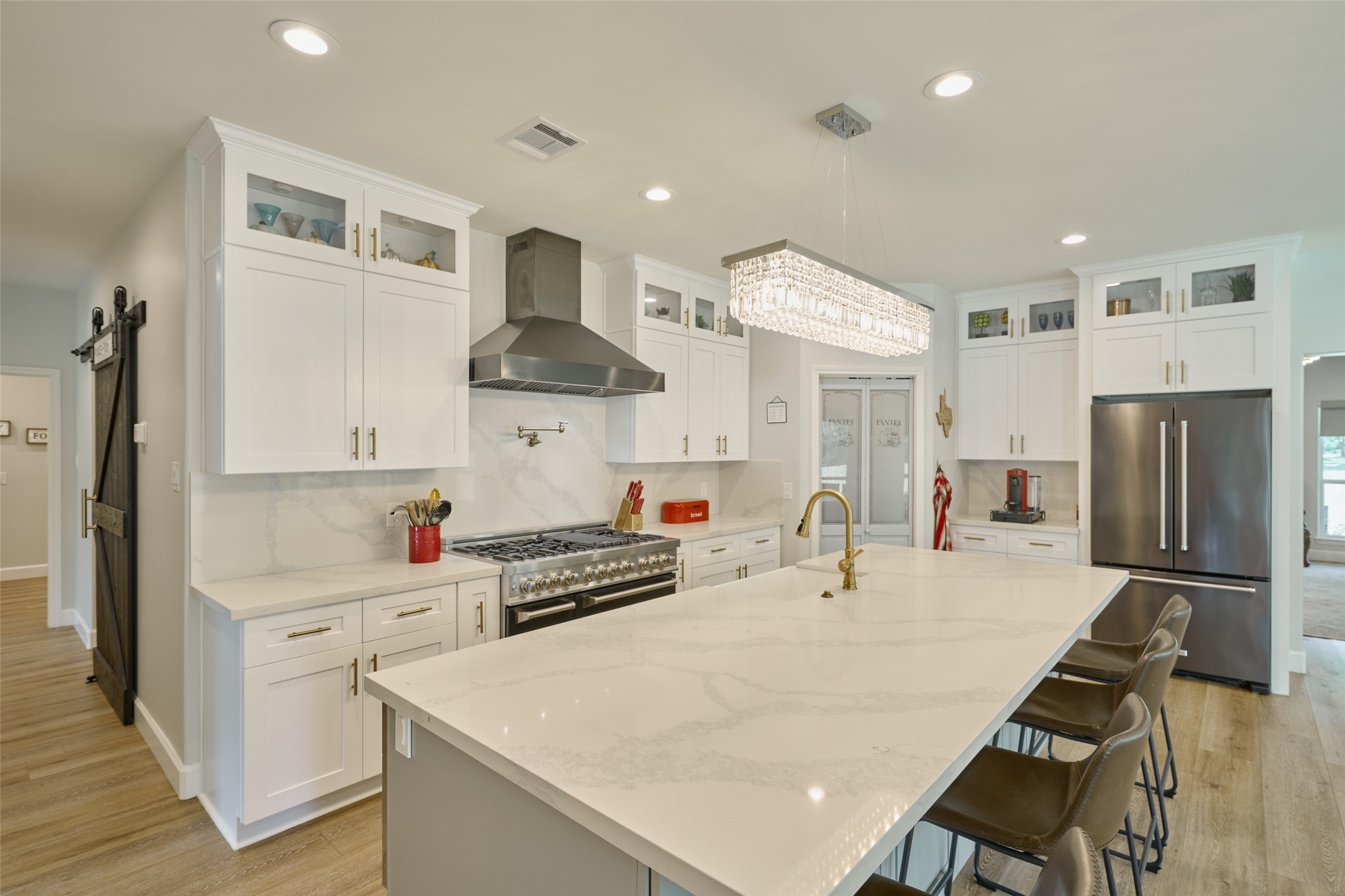 2218 Honea Egypt Road Magnolia, TX 77354 - Photo 33 of 50 Elevate your culinary experience with a premium Zline professional range in a sleek, modern kitchen designed for the discerning home chef.