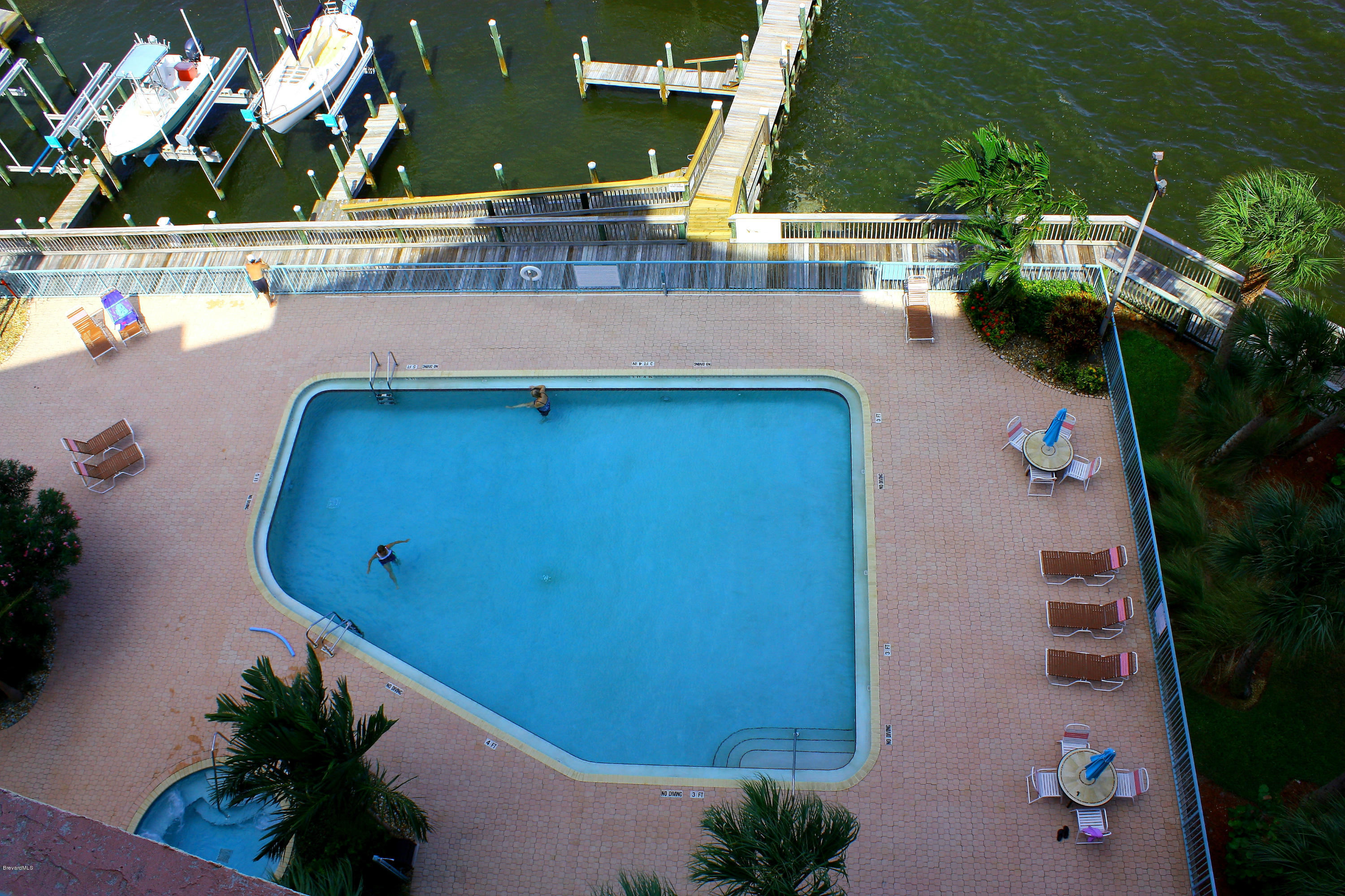 102 Riverside Drive, Unit 804 Cocoa, FL 32922 - Photo 3 of 18 Oleander Pointe Pool Deck