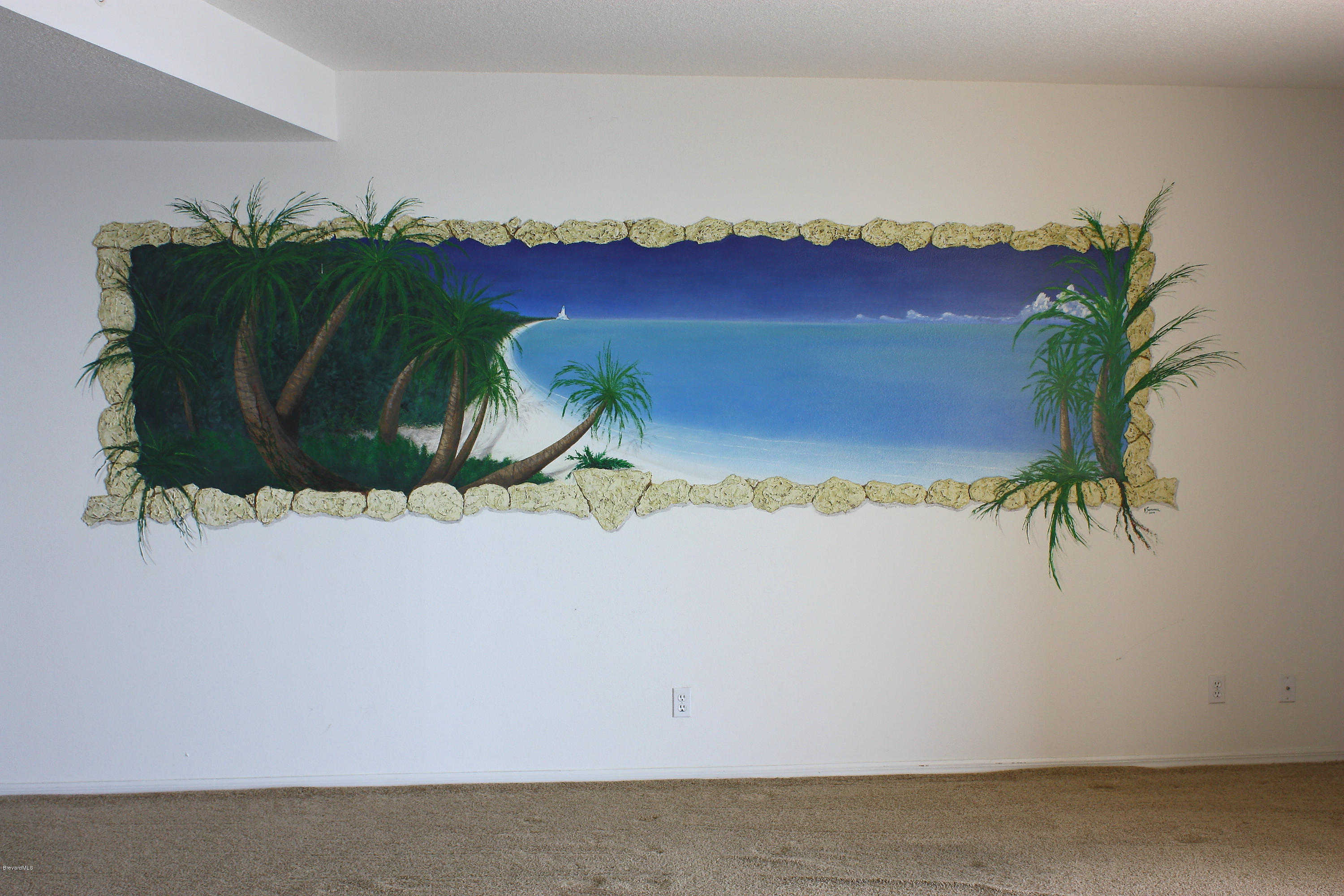 102 Riverside Drive, Unit 804 Cocoa, FL 32922 - Photo 8 of 18 Oleander Pointe Living Room Wall Art