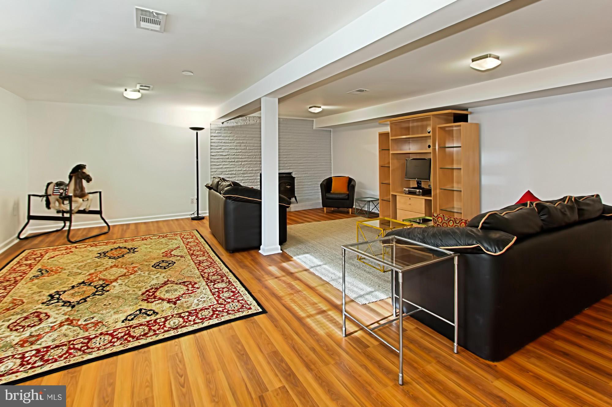 4513 Ferry Landing Road Alexandria, VA 22309 - Photo 20 of 30 Family room with new flooring and lighting