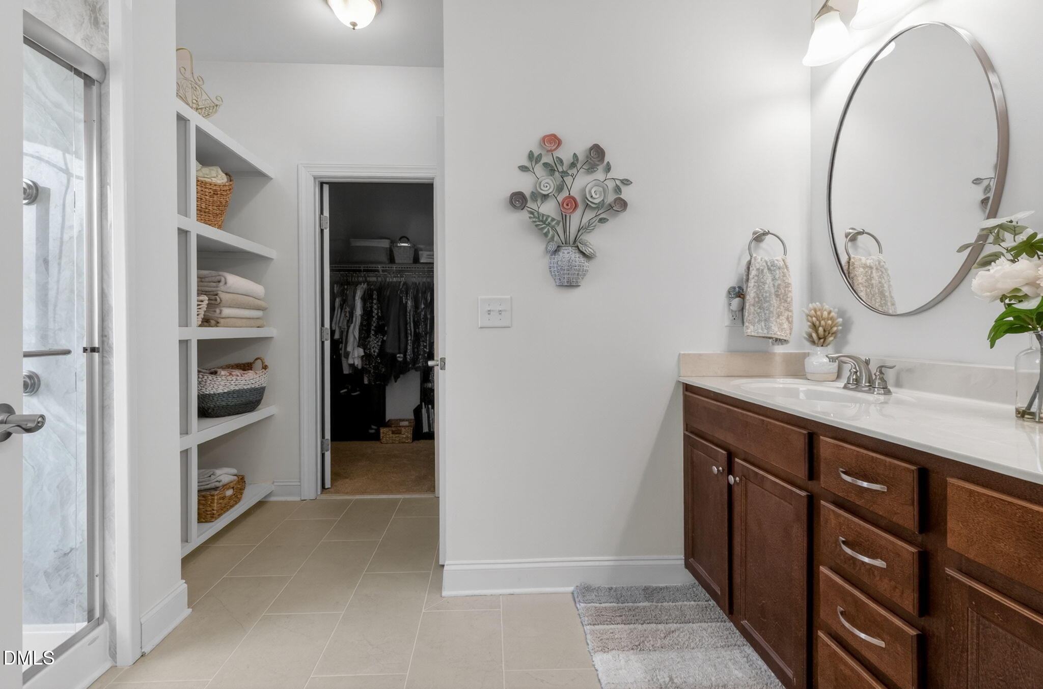 20 Deep Clay Circle Angier, NC 27501 - Photo 29 of 54 a spacious bathroom with a double vanity sink and a mirror