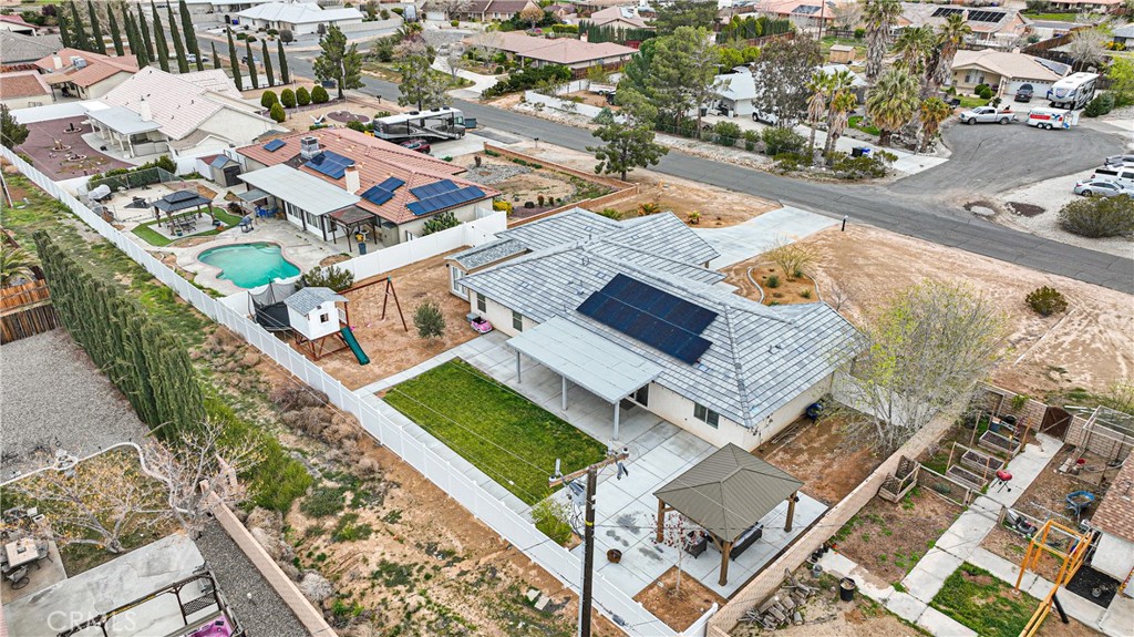 13968 Chogan Road Apple Valley, CA 92307 - Photo 2 of 35 an aerial view of residential house with outdoor space