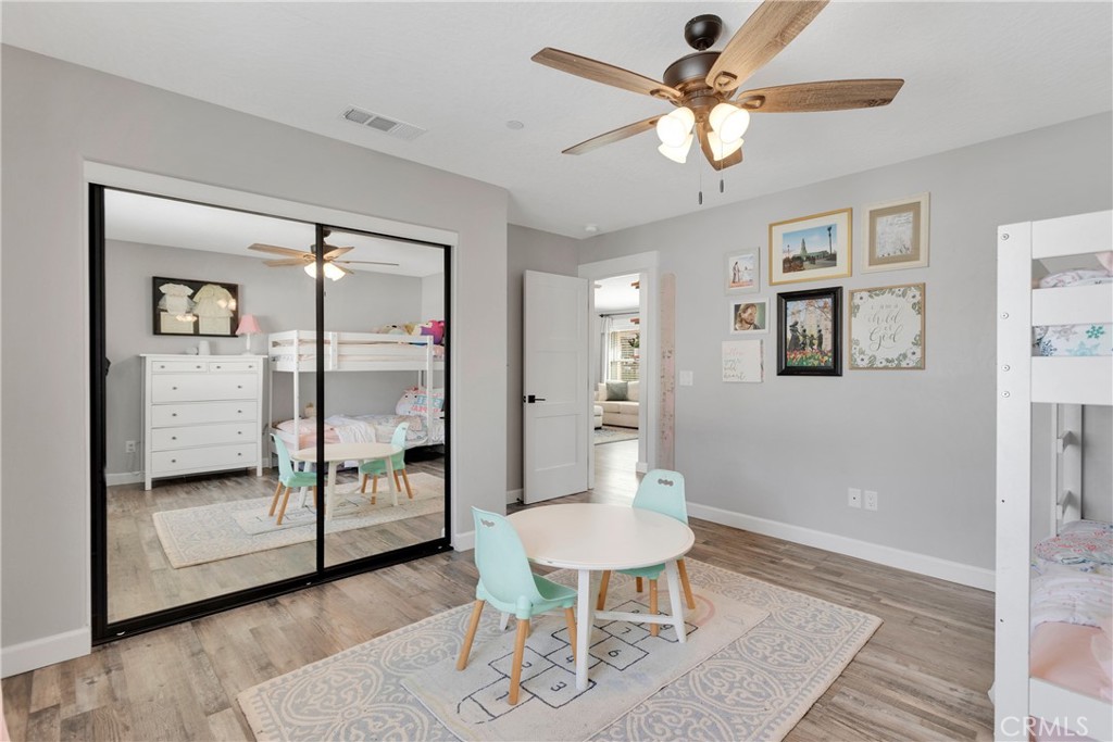 13968 Chogan Road Apple Valley, CA 92307 - Photo 21 of 35 a view of a livingroom with furniture and a rug