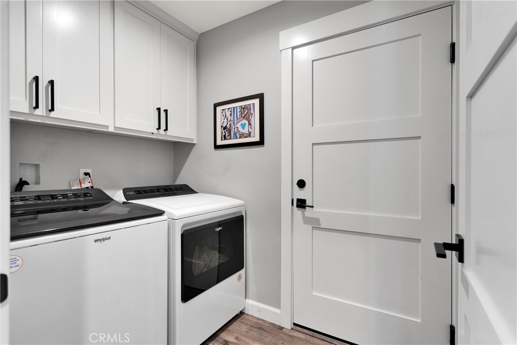 13968 Chogan Road Apple Valley, CA 92307 - Photo 23 of 35 a utility room with dryer and washer