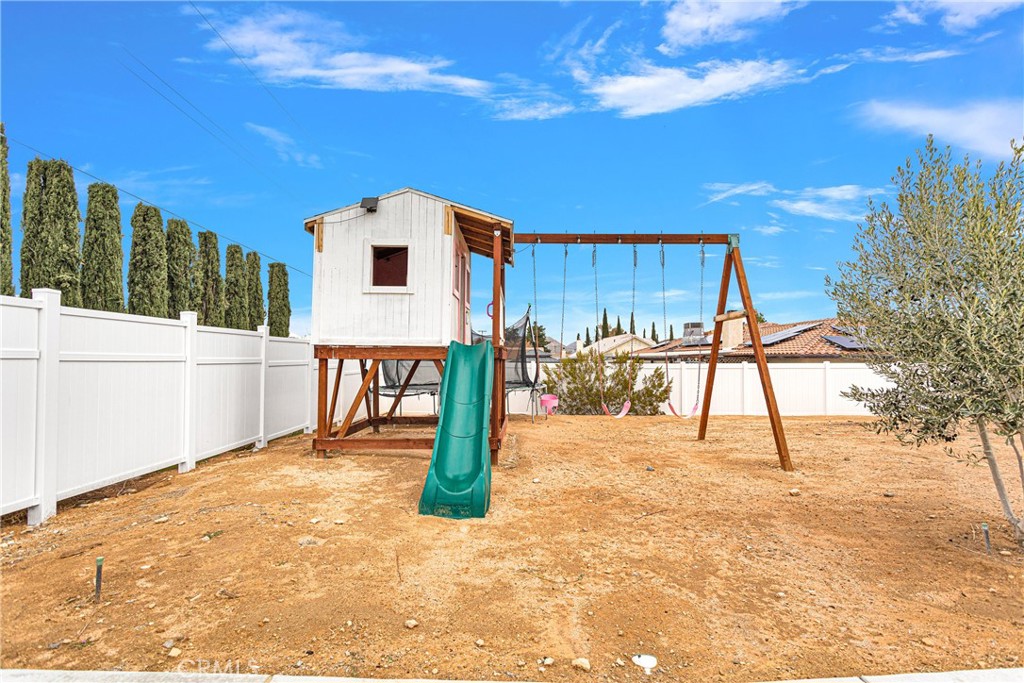 13968 Chogan Road Apple Valley, CA 92307 - Photo 29 of 35 a house view with a outdoor space