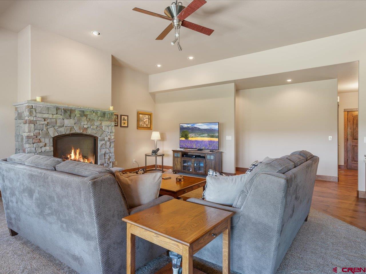 20784 6840th Road Montrose, CO 81403 - Photo 17 of 35 a living room with furniture and a fireplace