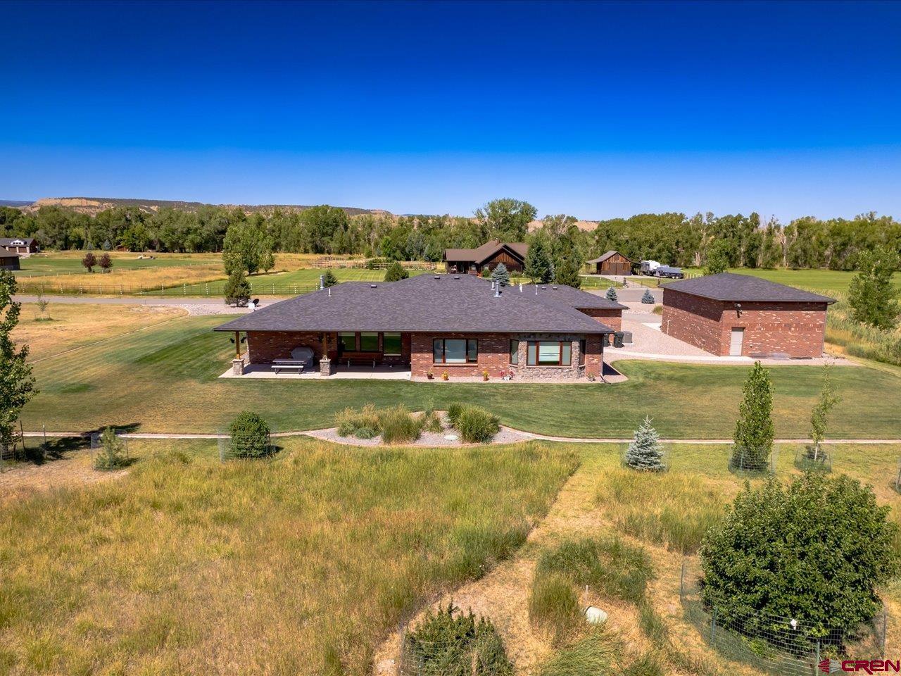 20784 6840th Road Montrose, CO 81403 - Photo 4 of 35 a view of a house with a yard