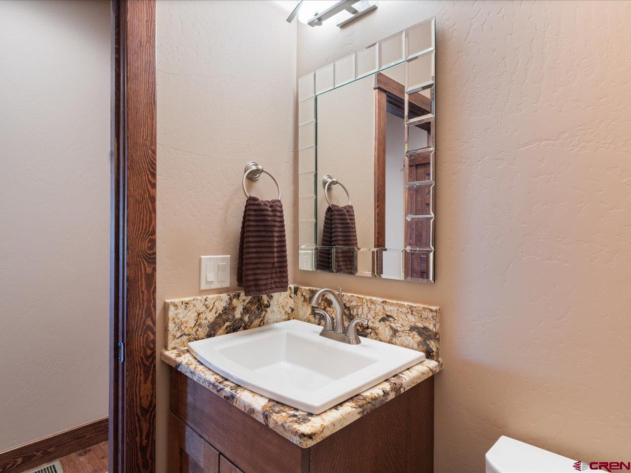 20784 6840th Road Montrose, CO 81403 - Photo 9 of 35 a bathroom with a sink and a mirror