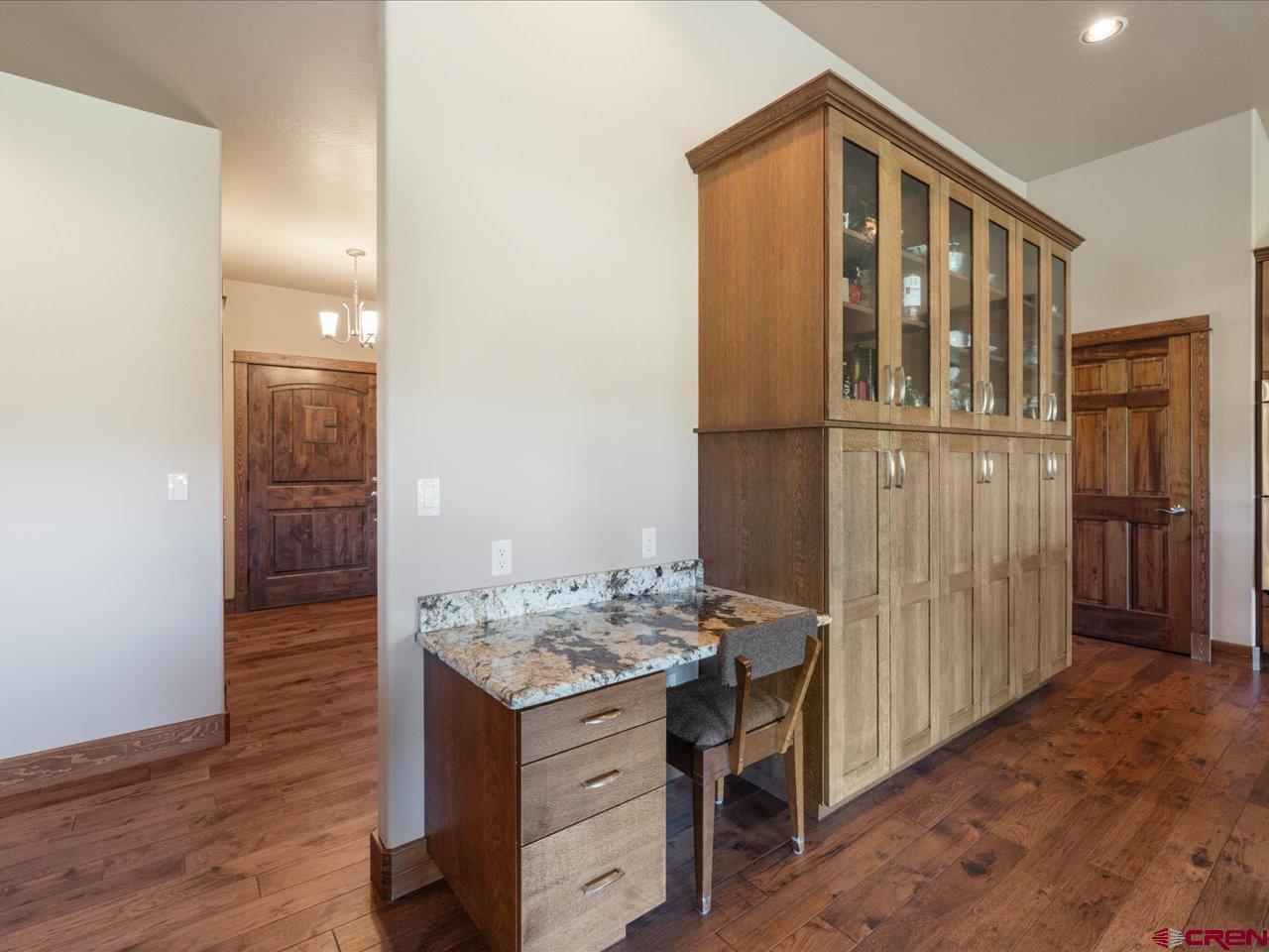 20784 6840th Road Montrose, CO 81403 - Photo 10 of 35 a bathroom with a granite countertop sink and a mirror