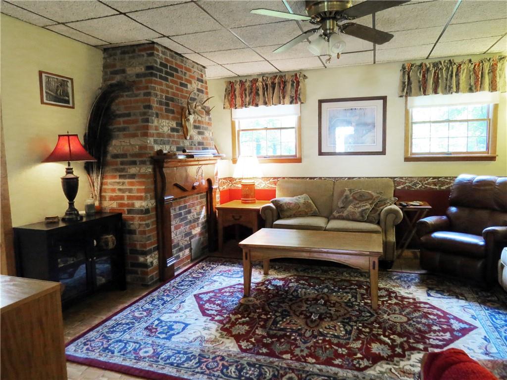 2056 Prospect Road Prospect, PA 16052 - Photo 4 of 25 a living room with furniture a rug and a window