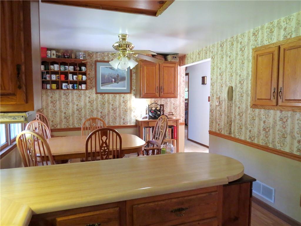 2056 Prospect Road Prospect, PA 16052 - Photo 5 of 25 a view of a dining room with furniture and chandelier