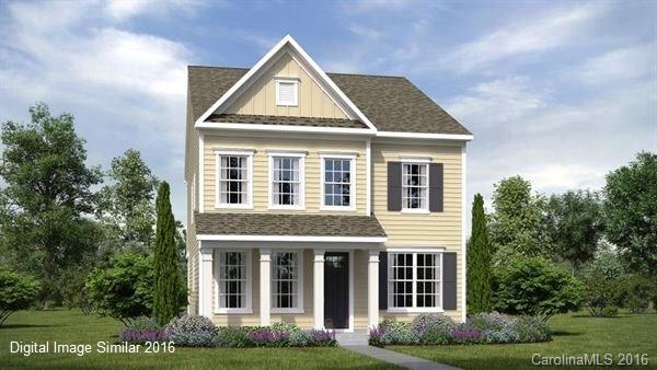 261 Helton Lane, Unit 86 Fort Mill, SC 29708 - Photo 1 of 1 a front view of a house with garden