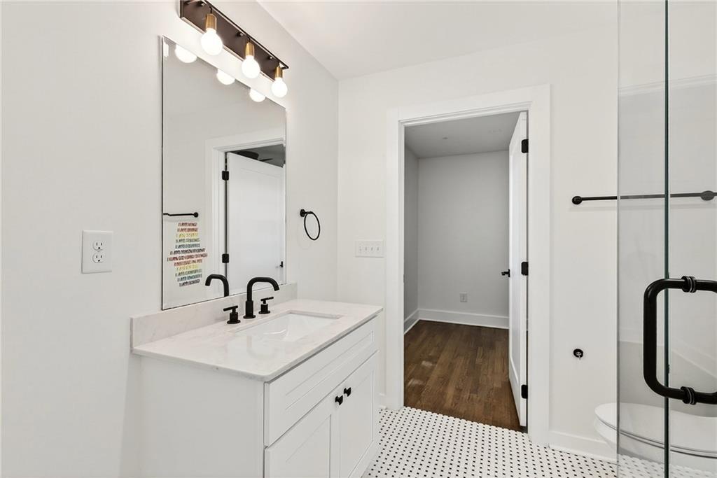 1344 Midlawn Drive Decatur, GA 30032 - Photo 32 of 87 a bathroom with a sink and a mirror