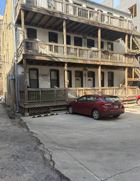 2817 North Orchard Street, Unit P9 Chicago, IL 60657 - Photo 2 of 2 a car parked in front of a building