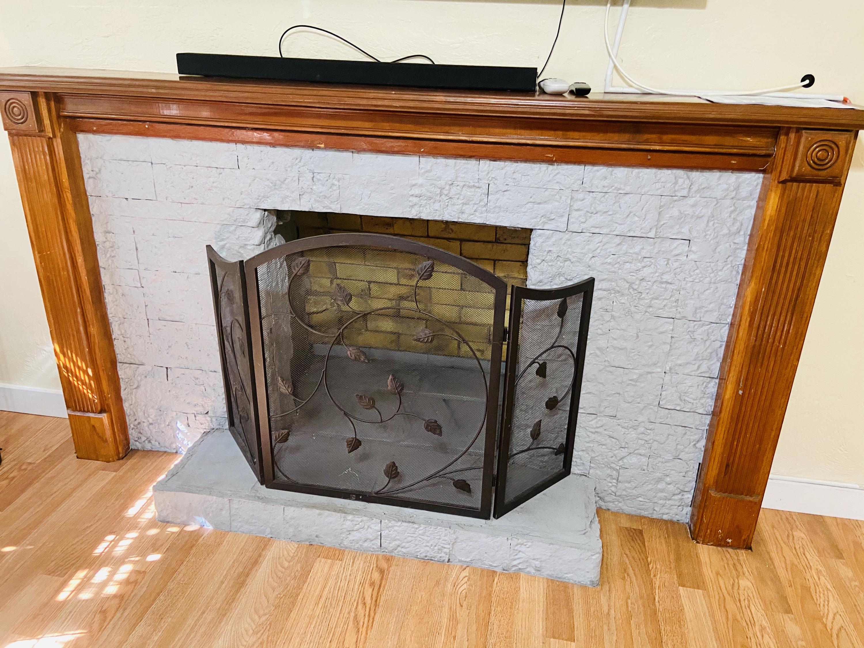829 Cherry Road West Palm Beach, FL 33409 - Photo 5 of 18 Fireplace