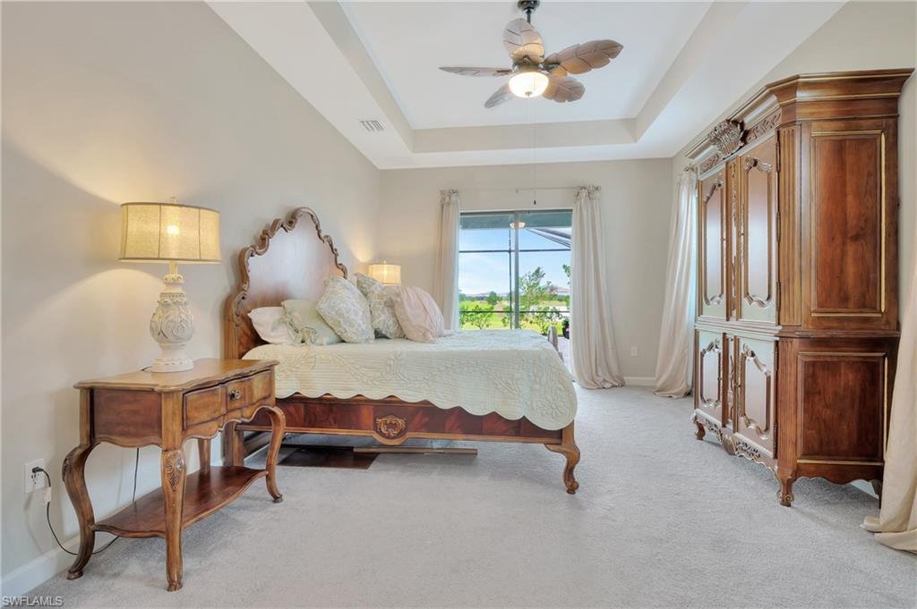 11721 Canopy Loop Fort Myers, FL 33913 - Photo 23 of 40 Primary Bedroom w/ Access to Pool / Spa
