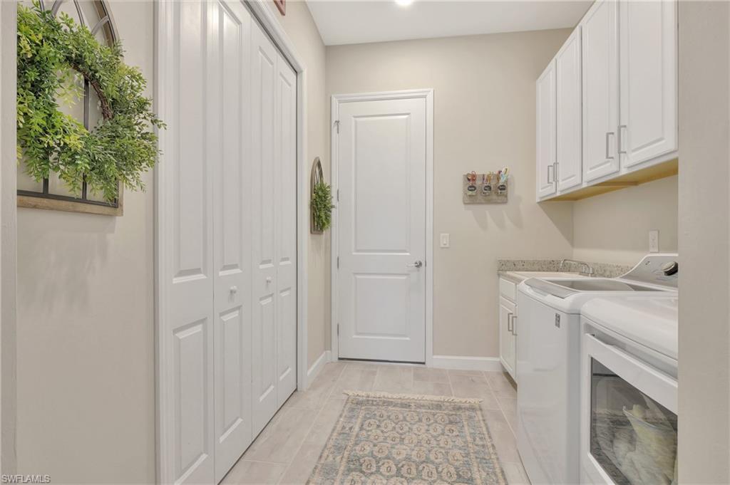 11721 Canopy Loop Fort Myers, FL 33913 - Photo 37 of 40 Laundry Room w/ Plenty of storage and Oversized Utility Sink