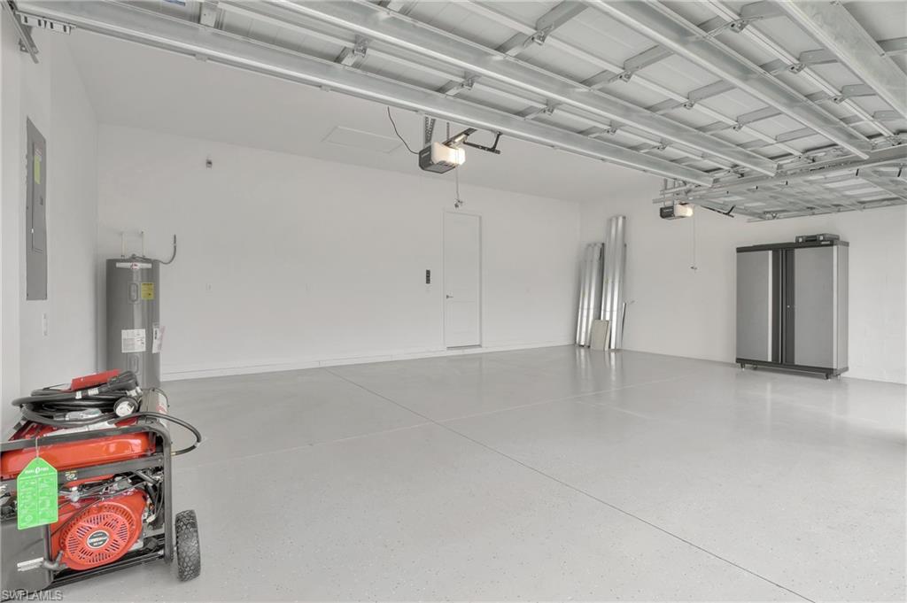11721 Canopy Loop Fort Myers, FL 33913 - Photo 39 of 40 3 Car Garage w/ Epoxy Flooring