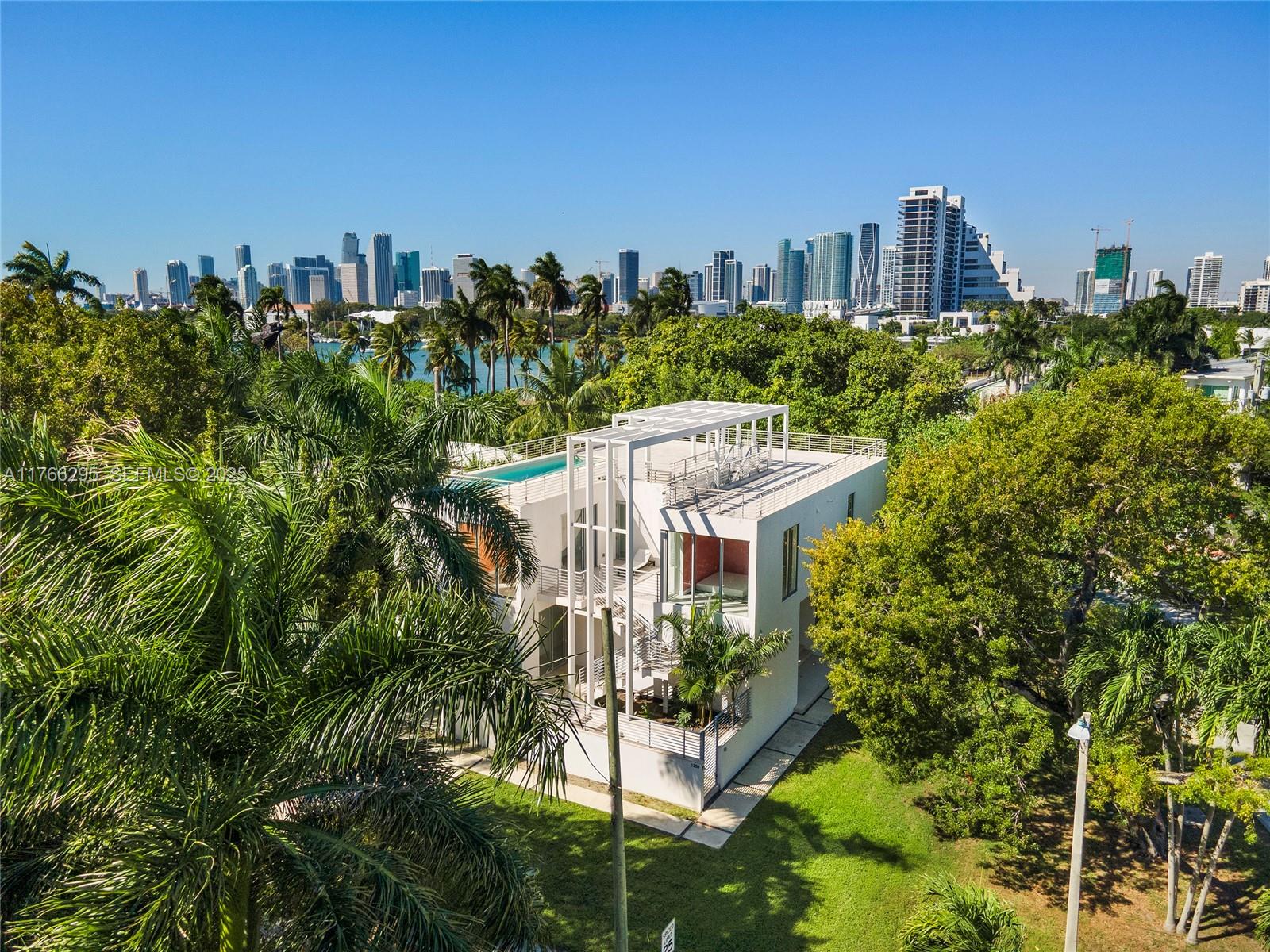 1250 North Venetian Way Miami, FL 33139 - Photo 16 of 61 a view of a city with tall buildings
