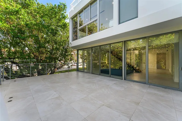 a view of a livingroom with furniture and a fireplace