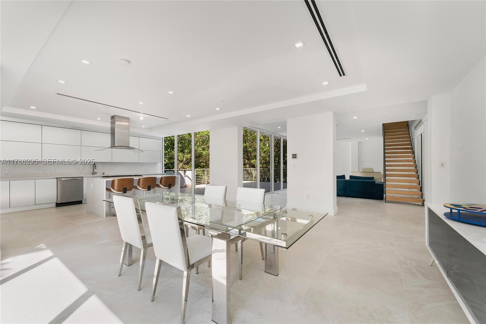 1250 North Venetian Way Miami, FL 33139 - Photo 26 of 61 a view of a dining room with furniture
