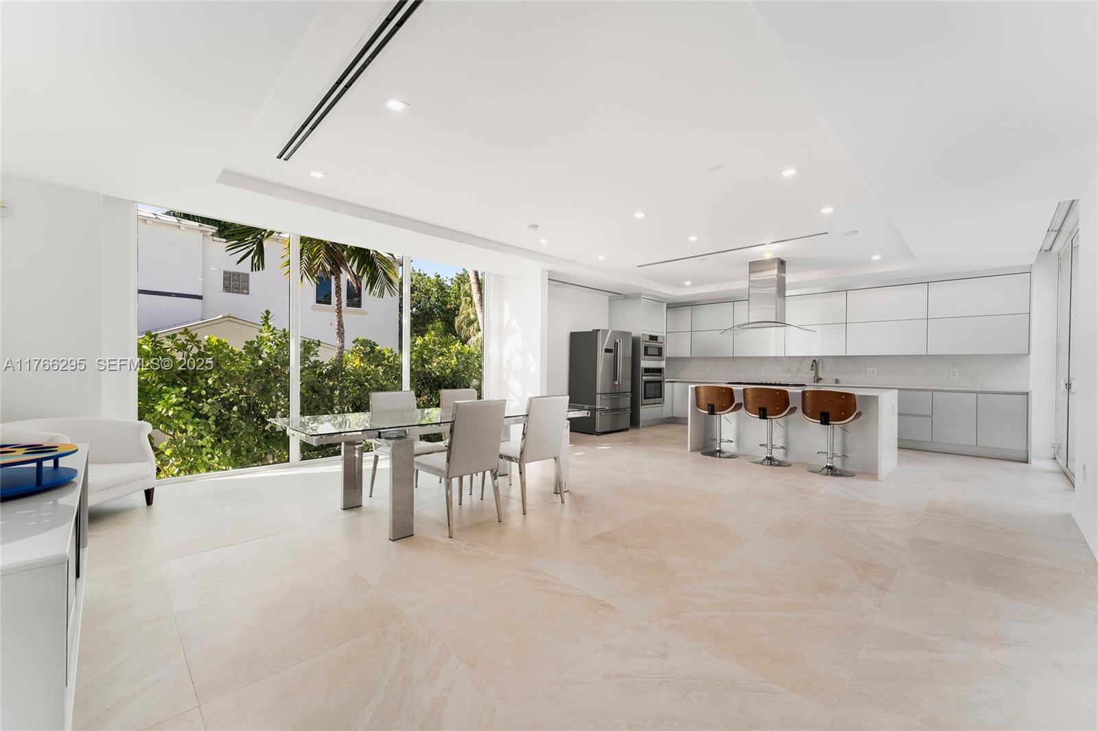 1250 North Venetian Way Miami, FL 33139 - Photo 27 of 61 a view of a livingroom with furniture and a fireplace