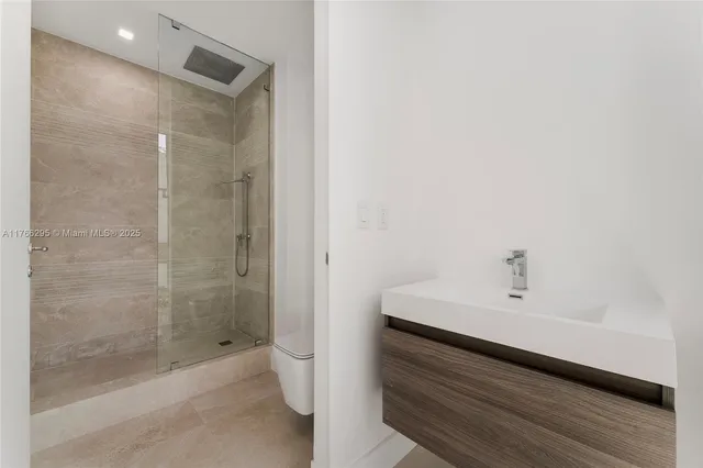 a view of an empty room with a balcony