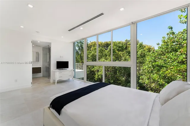 a view of an empty room with stairs