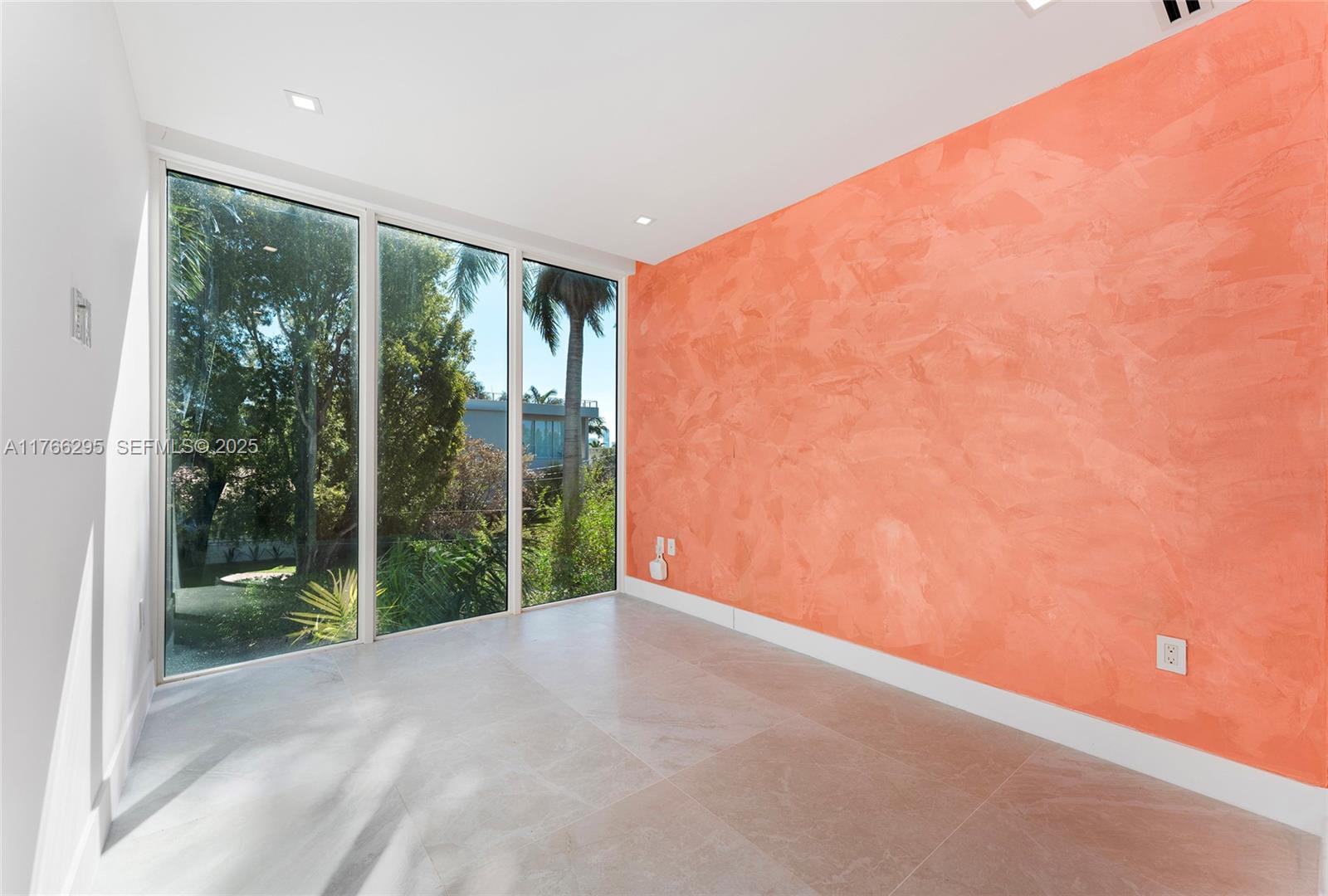 1250 North Venetian Way Miami, FL 33139 - Photo 40 of 61 a view of a big room with wooden floor and garden