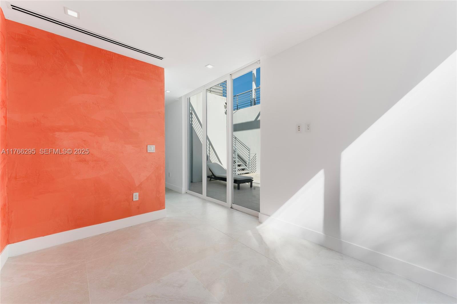 1250 North Venetian Way Miami, FL 33139 - Photo 42 of 61 a view of an empty room with stairs