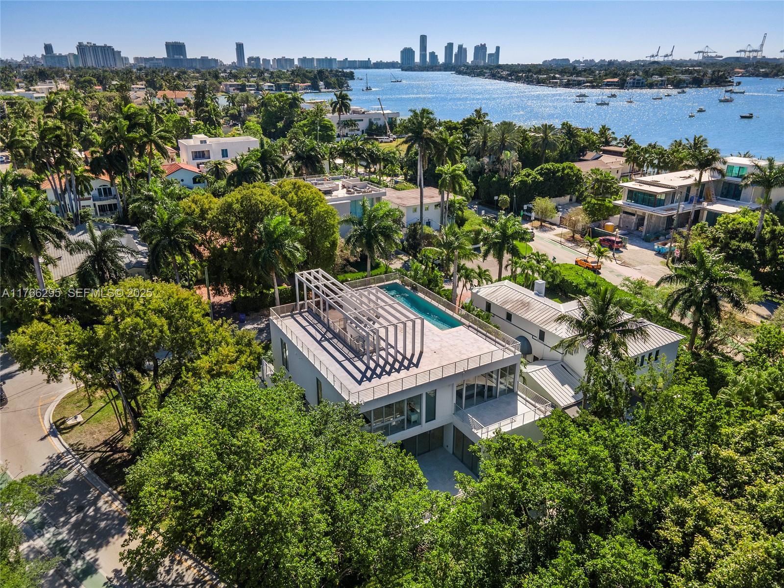 1250 North Venetian Way Miami, FL 33139 - Photo 57 of 61 an aerial view of a house with a garden