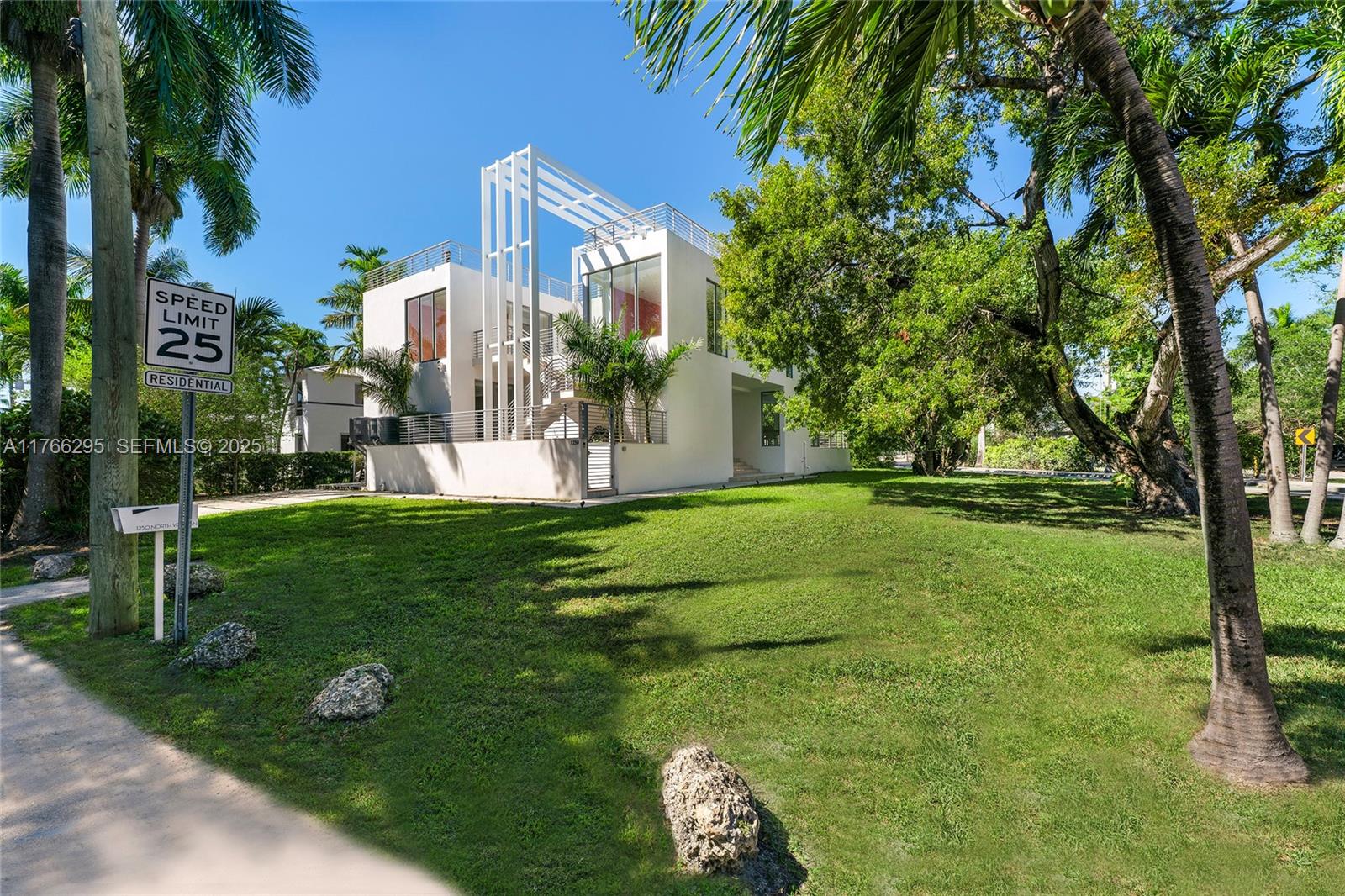 1250 North Venetian Way Miami, FL 33139 - Photo 6 of 61 a view of a park with large trees