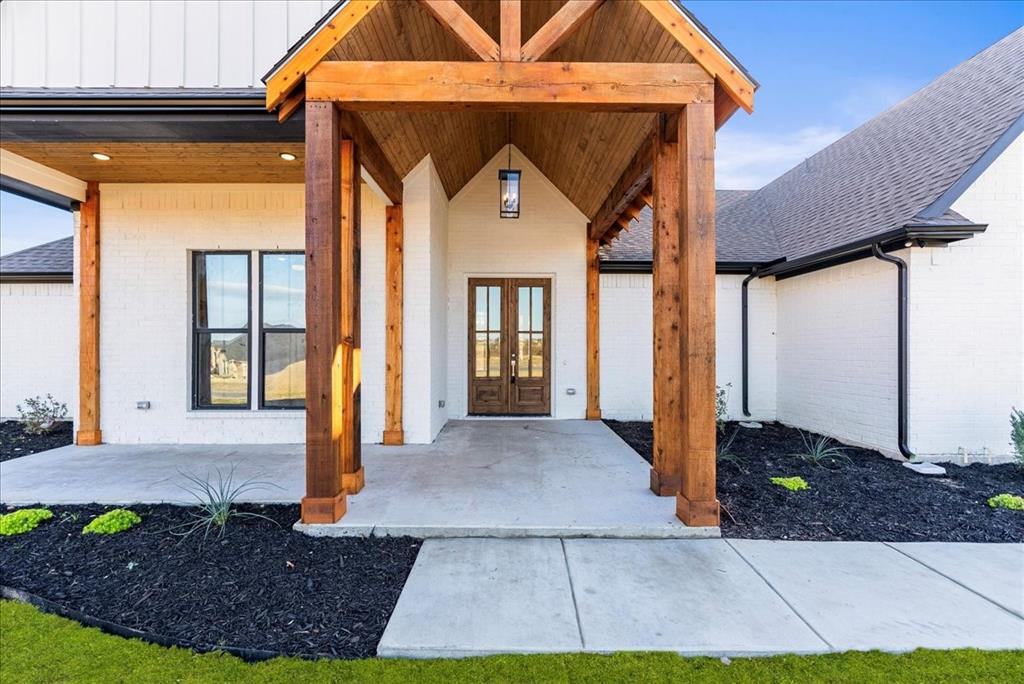 6421 Starlight Ranch Road Godley, TX 76044 - Photo 2 of 39 a view of a house with a yard