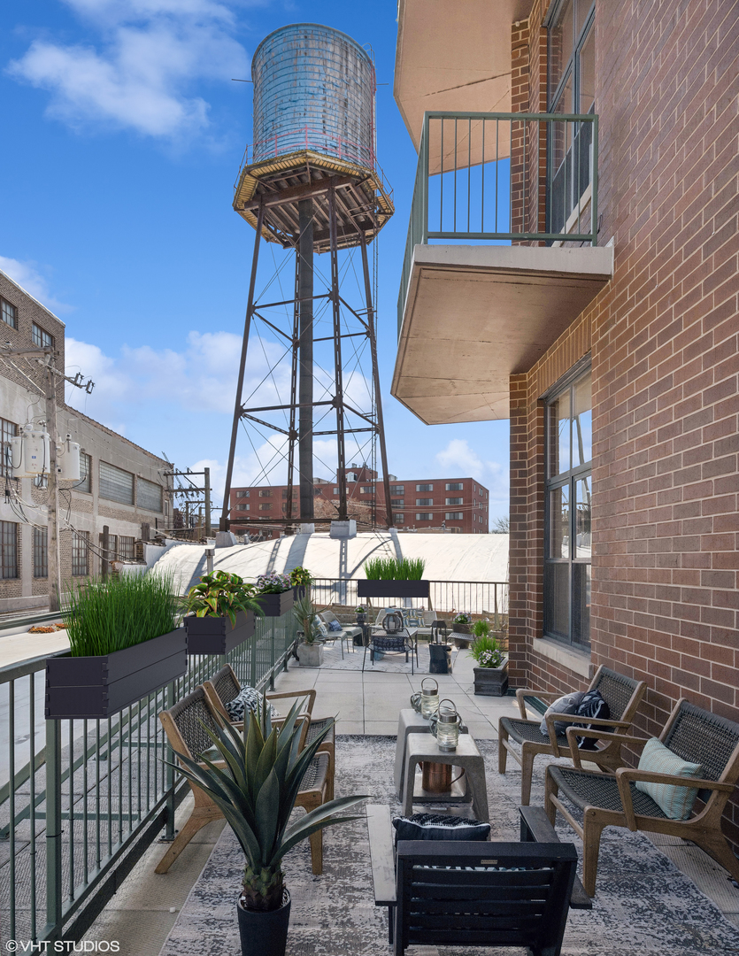 3631 North Halsted Street, Unit 208 Chicago, IL 60613 - Photo 16 of 19 a view of balcony and patio