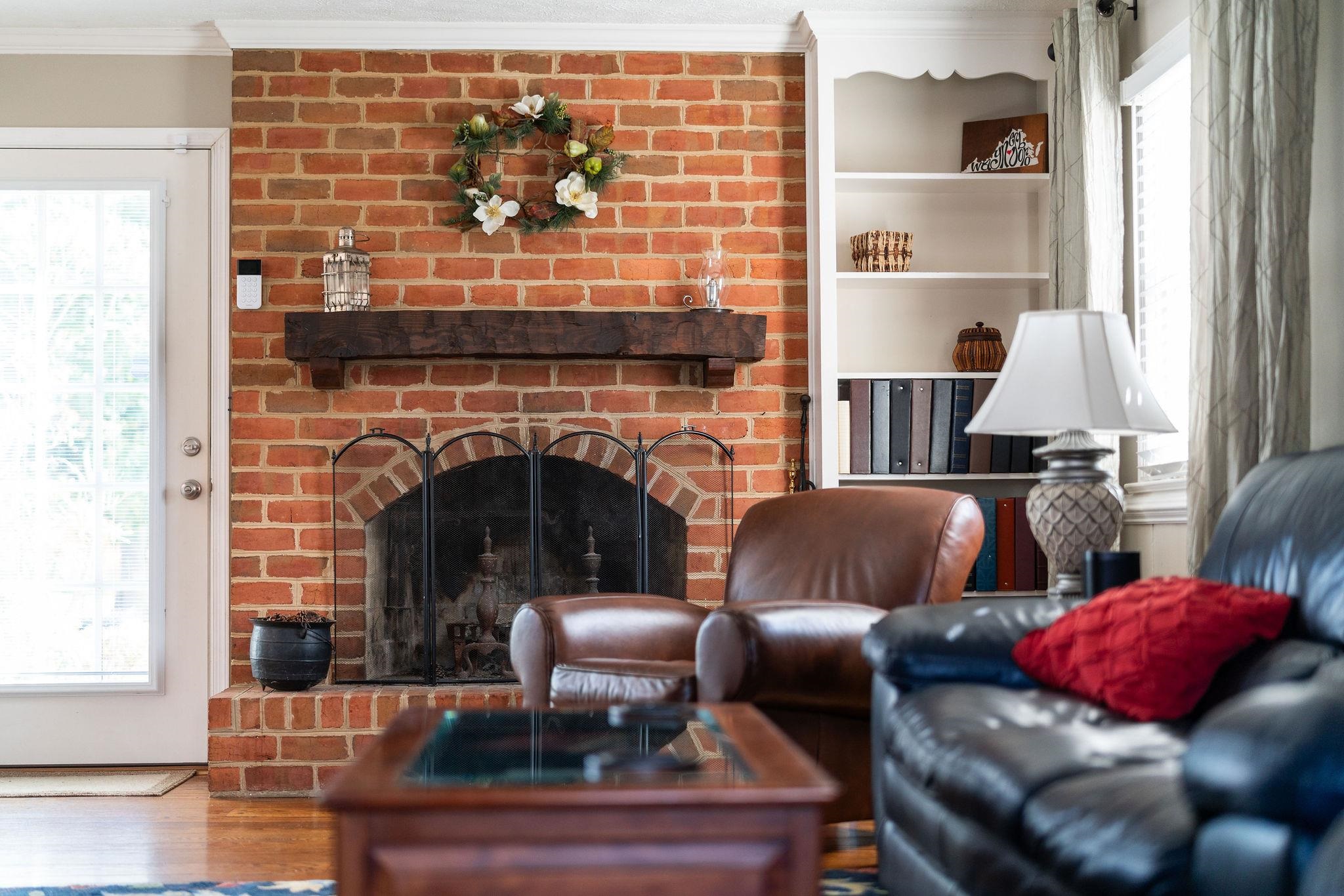112 Country Lodge Road Waynesboro, VA 22980 - Photo 33 of 74 a living room with furniture and a fireplace